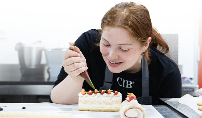 Student of the CIB professional pastry and confectionery course making bombons